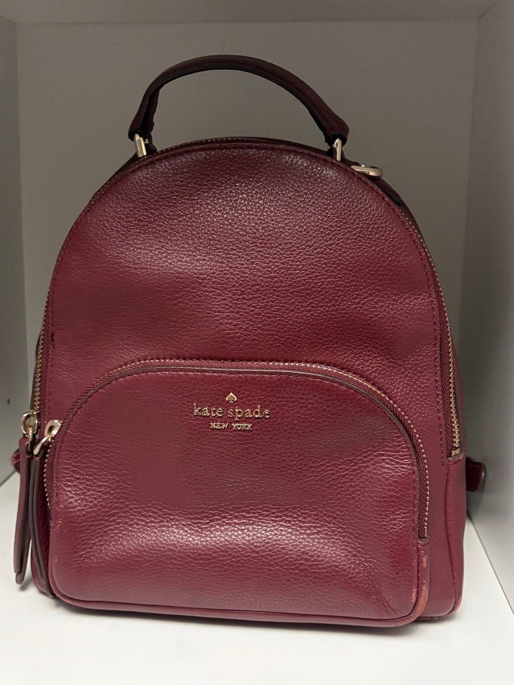 kate spade Burgundy Leather Backpack with Gold Hardware